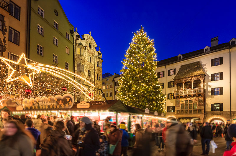 Christmas tree over festive market in Innsbruck
