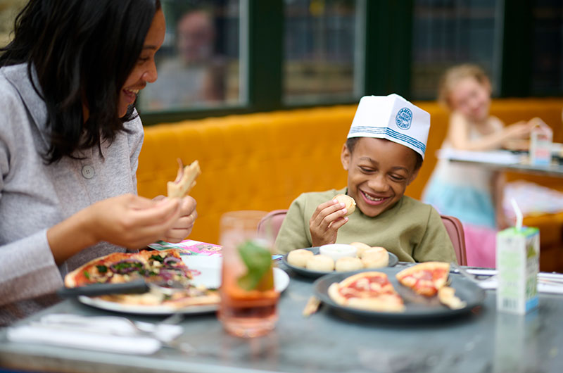 A child enjoying a nice meal at London Gatwick's restaurants