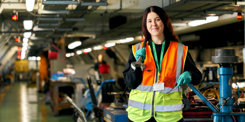 headshot photo of Zoe with tools