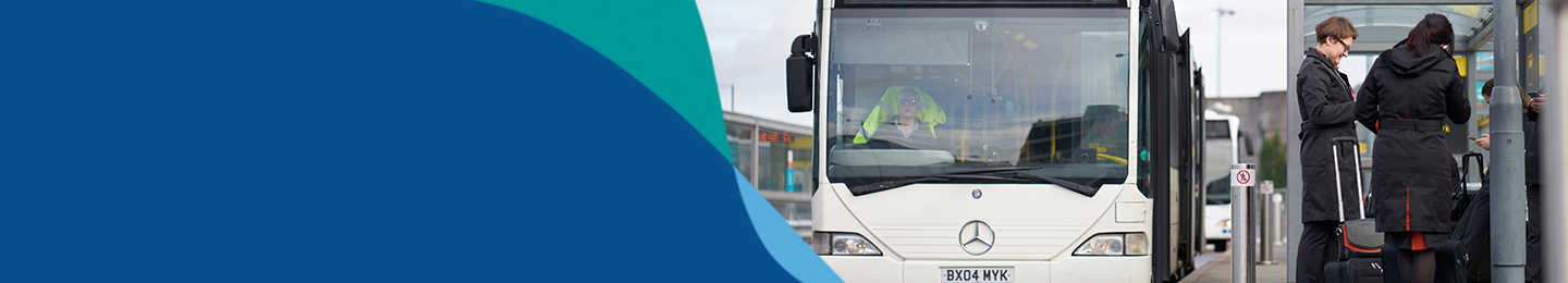 Banner image showing bus at bus stop with passengers