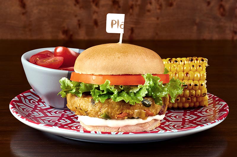 Image showing kids bean burger and sides at Nando's