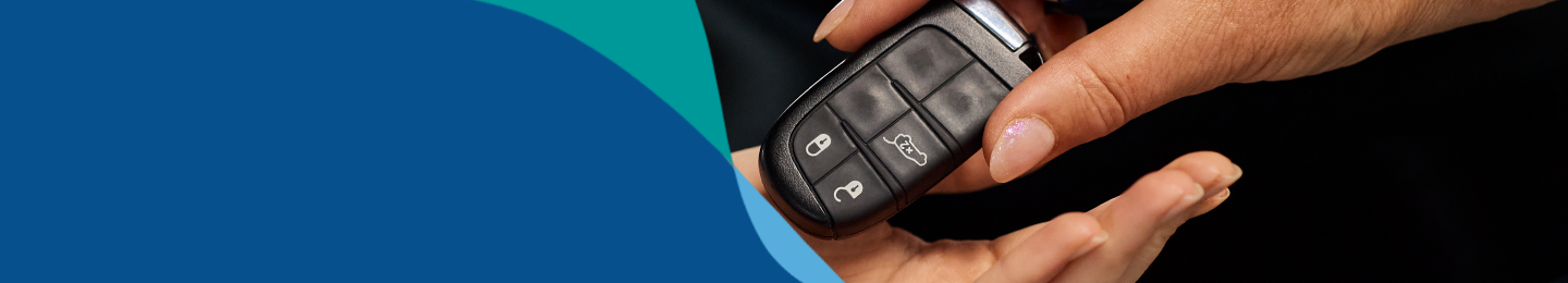 banner image showing car key being handed over to customer