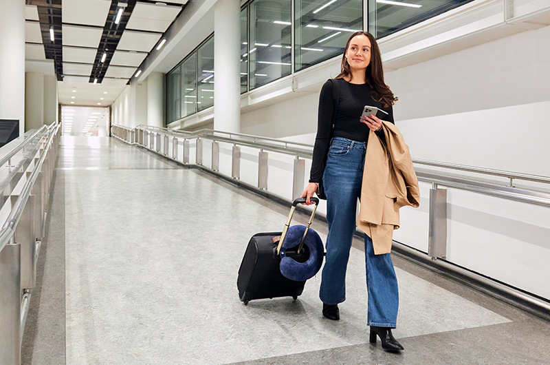 Image showing passenger walking down ramp in London Gatwick's Passport Control area