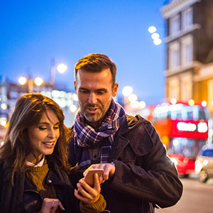 Couple enjoying an evening in London knowing their car is safe and secure in the Gatwick Short Stay car park