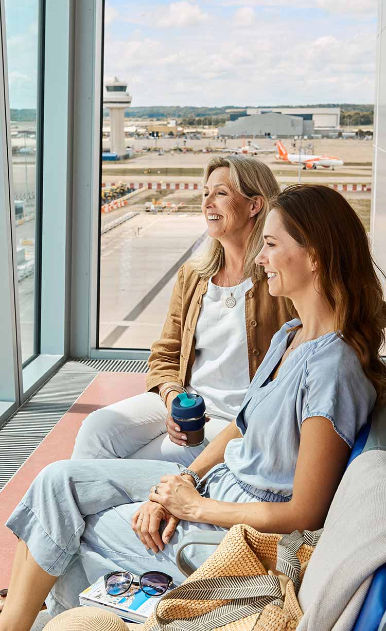 Background image showing passengers enjoying the London Gatwick experience