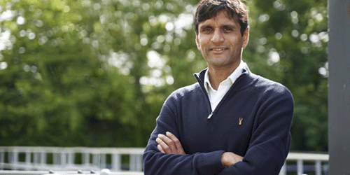 Profile headshot of Preetesh Shar with trees in the background