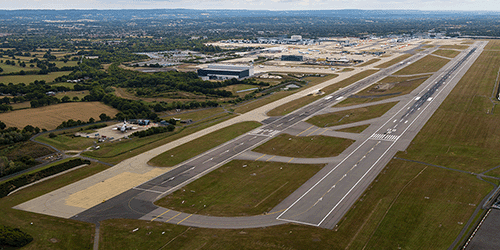 a low aerial shot of Gatwick from the western end of the runway