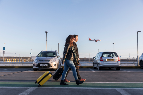 Passengers walking to the terminal building from Short Stay